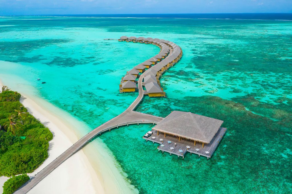 Cocoon Maldives Resort - Ookolhufinolhu, Lhaviyani Atoll, Maldives - Manta Restaurant and Overwater Villas Aerial View