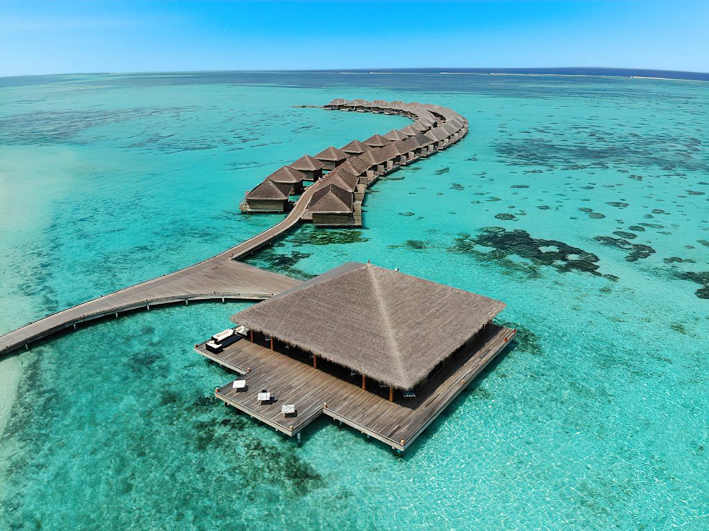 Cocoon Maldives Resort - Ookolhufinolhu, Lhaviyani Atoll, Maldives - Manta Restaurant and Overwater Villas Aerial View
