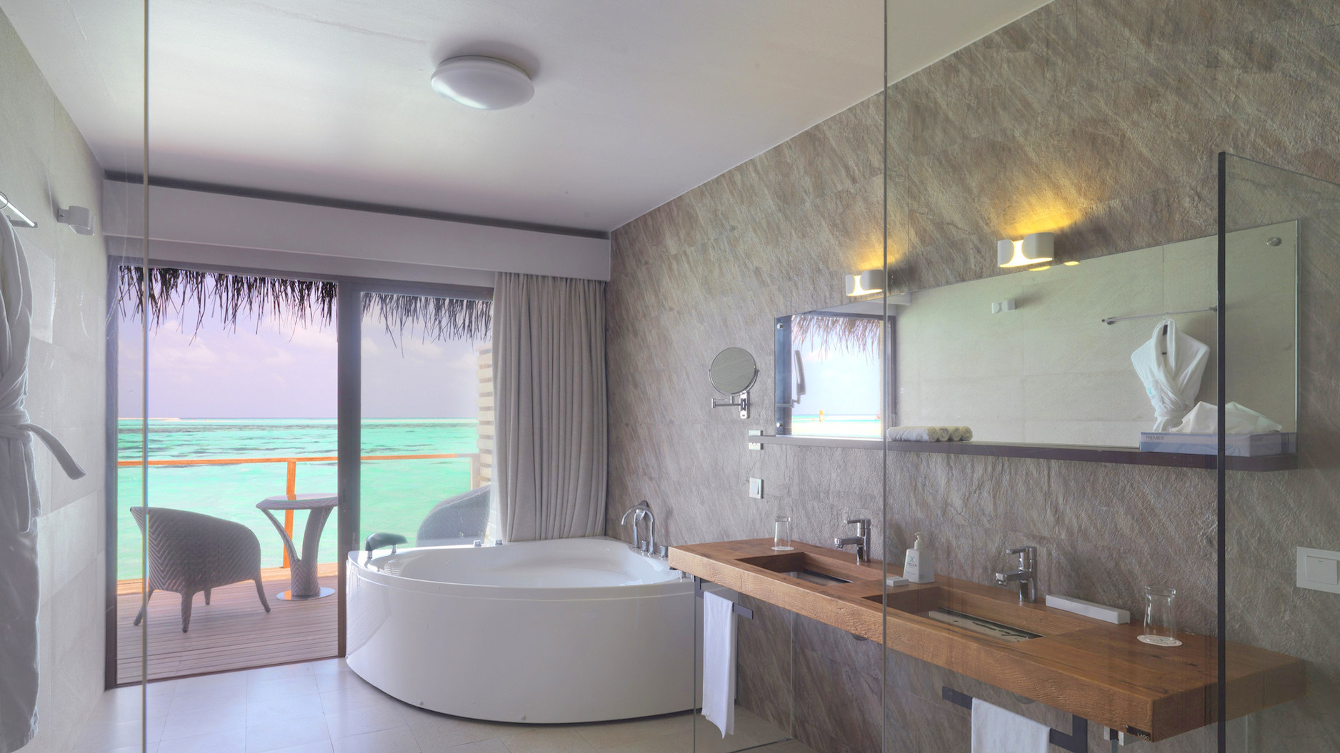 Cocoon Maldives Resort - Ookolhufinolhu, Lhaviyani Atoll, Maldives - Lagoon Overwater Suite Bathroom