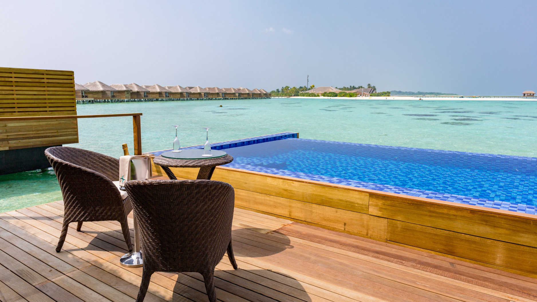 Cocoon Maldives Resort – Ookolhufinolhu, Lhaviyani Atoll, Maldives – Lagoon Overwater Suite with Pool Deck Table