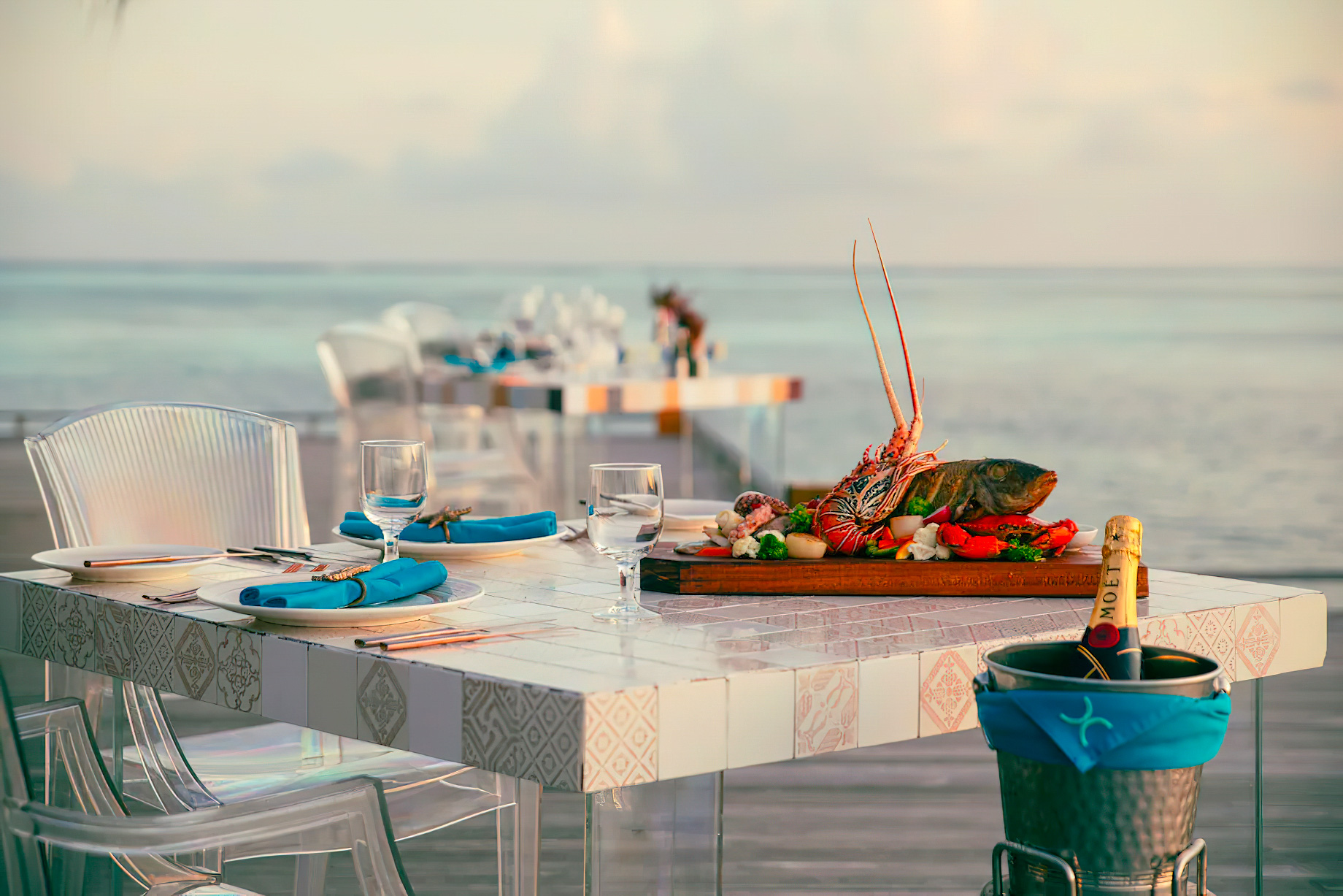 Cocoon Maldives Resort – Ookolhufinolhu, Lhaviyani Atoll, Maldives – Manta Overwater Restaurant Dining Tables