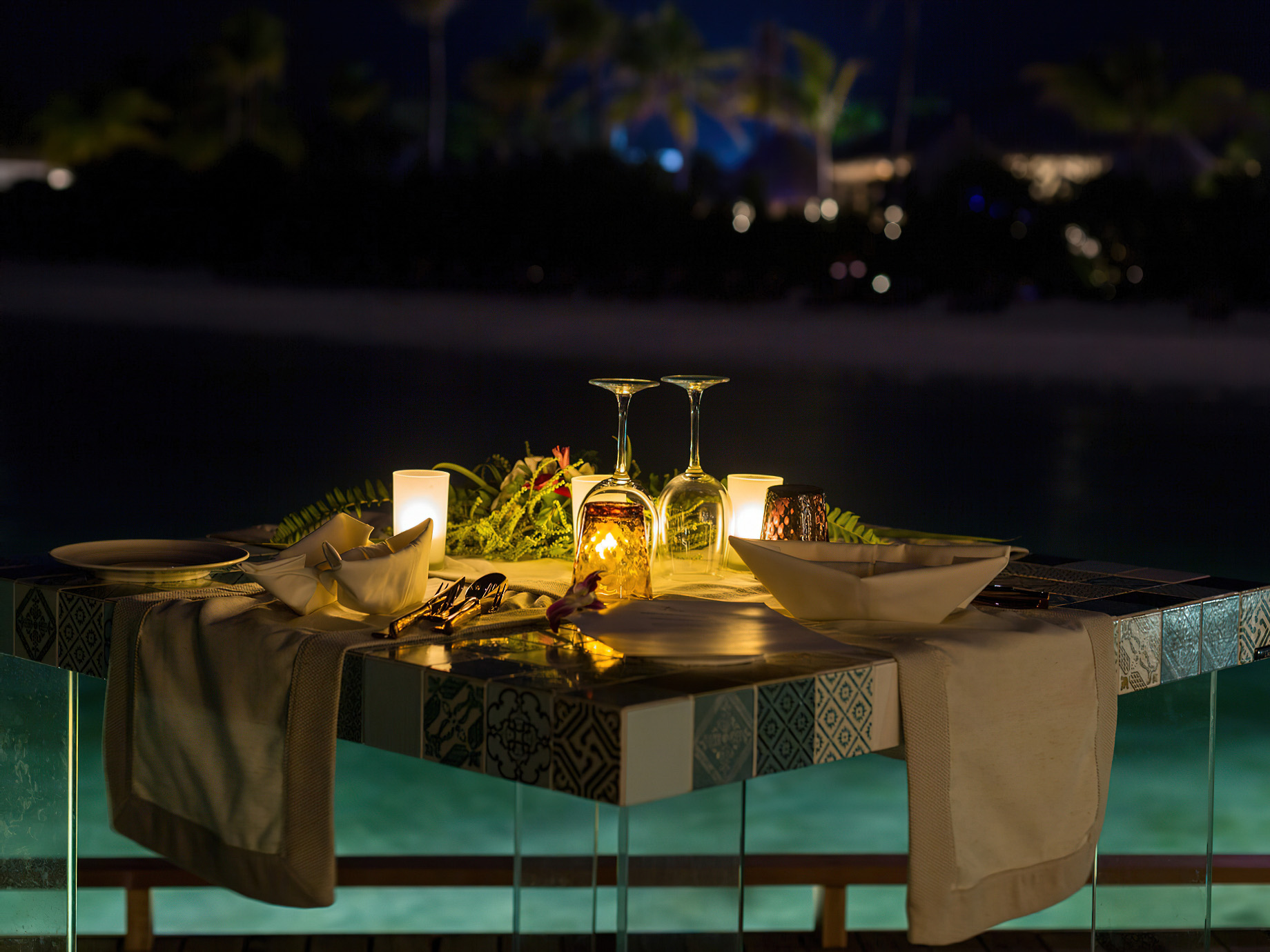 Cocoon Maldives Resort – Ookolhufinolhu, Lhaviyani Atoll, Maldives – Manta Overwater Restaurant Dining Table Night