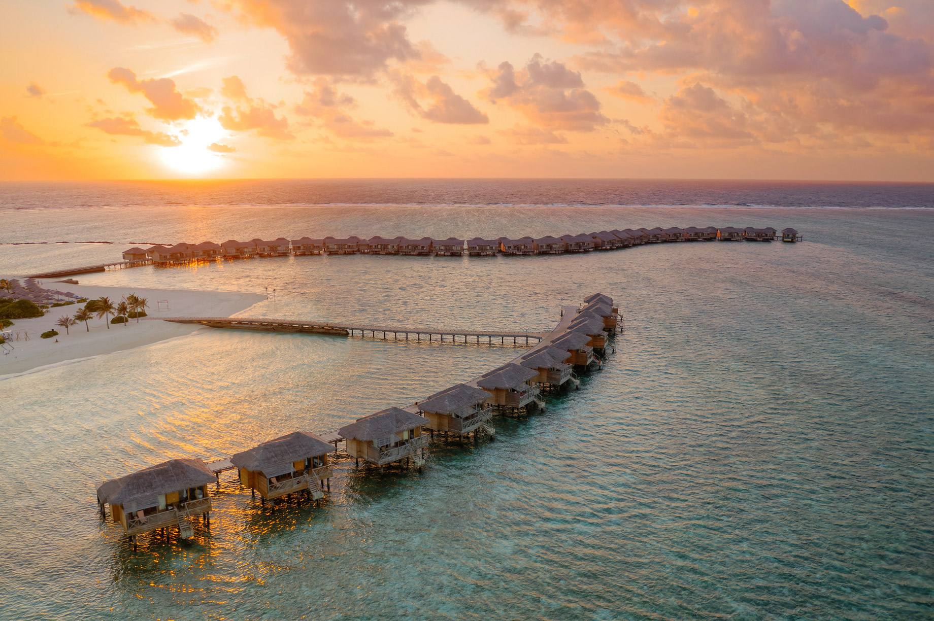 You & Me Maldives Resort – Uthurumaafaru, Raa Atoll, Maldives – Overwater Villa Sunset Aerial View