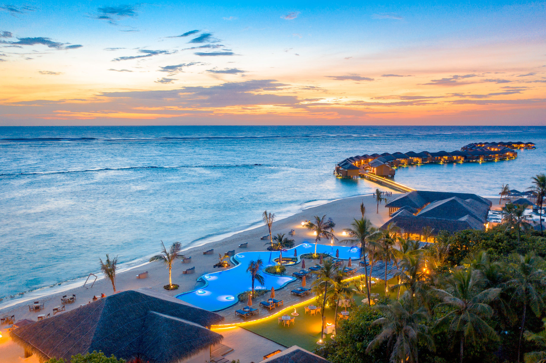 You & Me Maldives Resort – Uthurumaafaru, Raa Atoll, Maldives – Resort Pool Aerial View Sunset