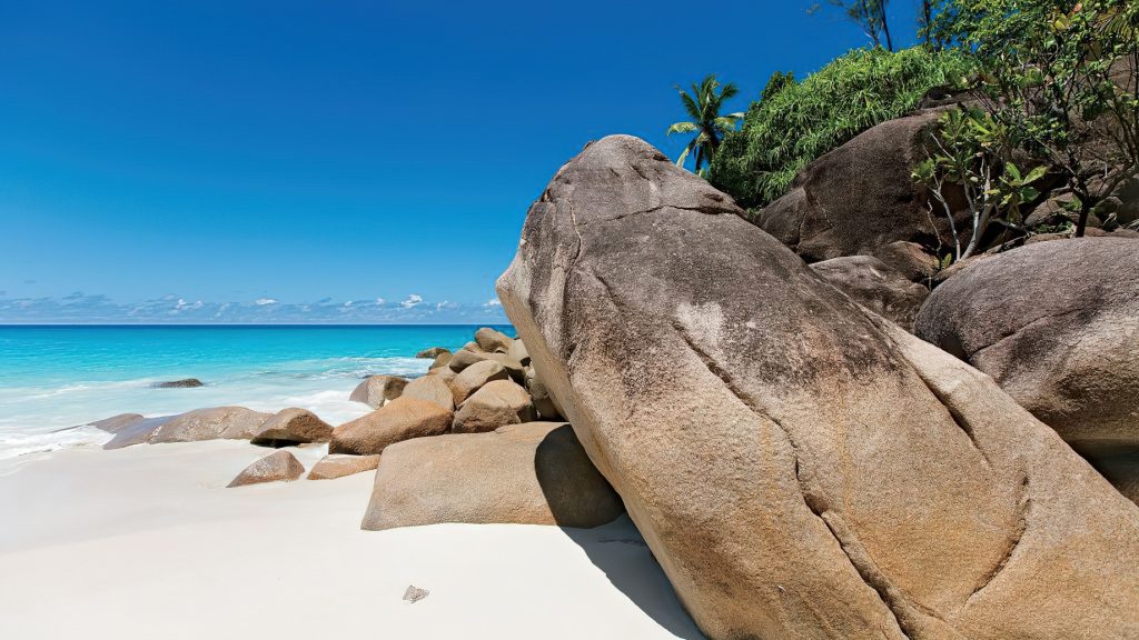 Constance Lemuria Resort - Praslin, Seychelles - Bolders on White Sand Beach