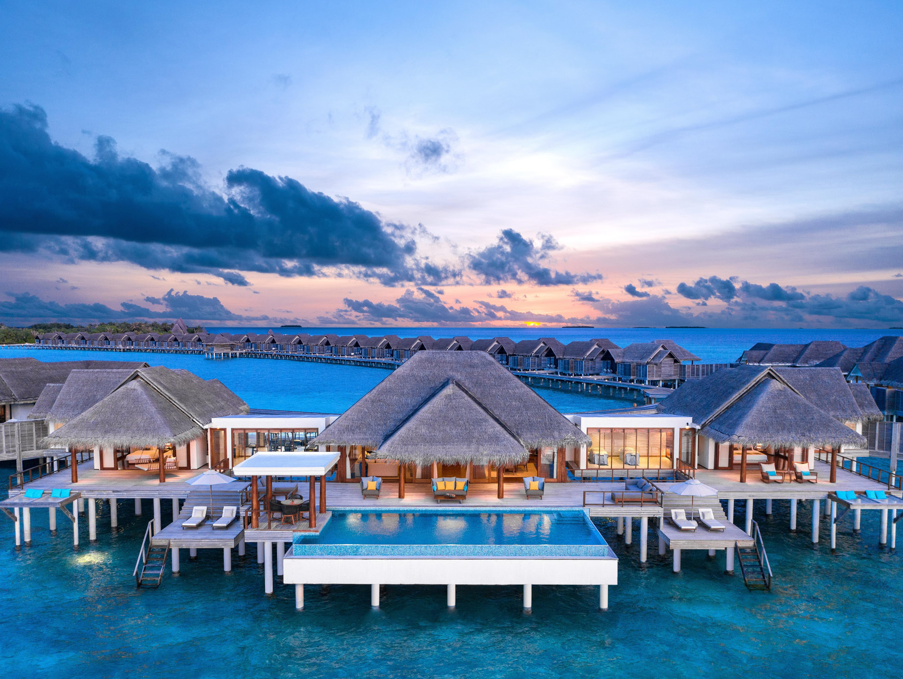 Anantara Kihavah Maldives Villas Resort – Baa Atoll, Maldives – Two Bedroom Sunset Over Water Pool Residence Aerial View Sunset