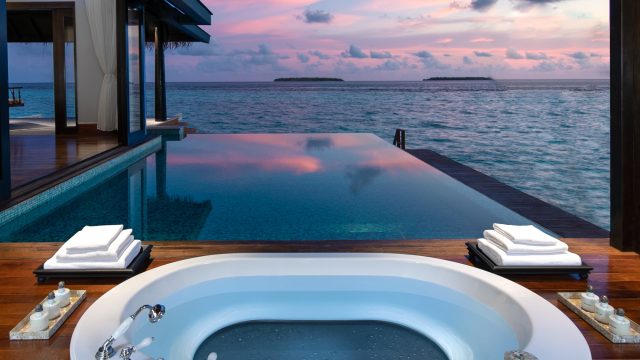 Anantara Kihavah Maldives Villas Resort - Baa Atoll, Maldives - Over Water Pool Villa Bathroom Ocean View Sunset