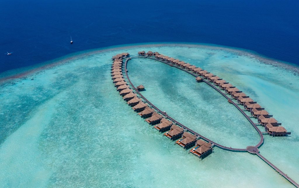 Anantara Kihavah Maldives Villas Resort - Baa Atoll, Maldives - Overwater Villas Jetty Aerial View