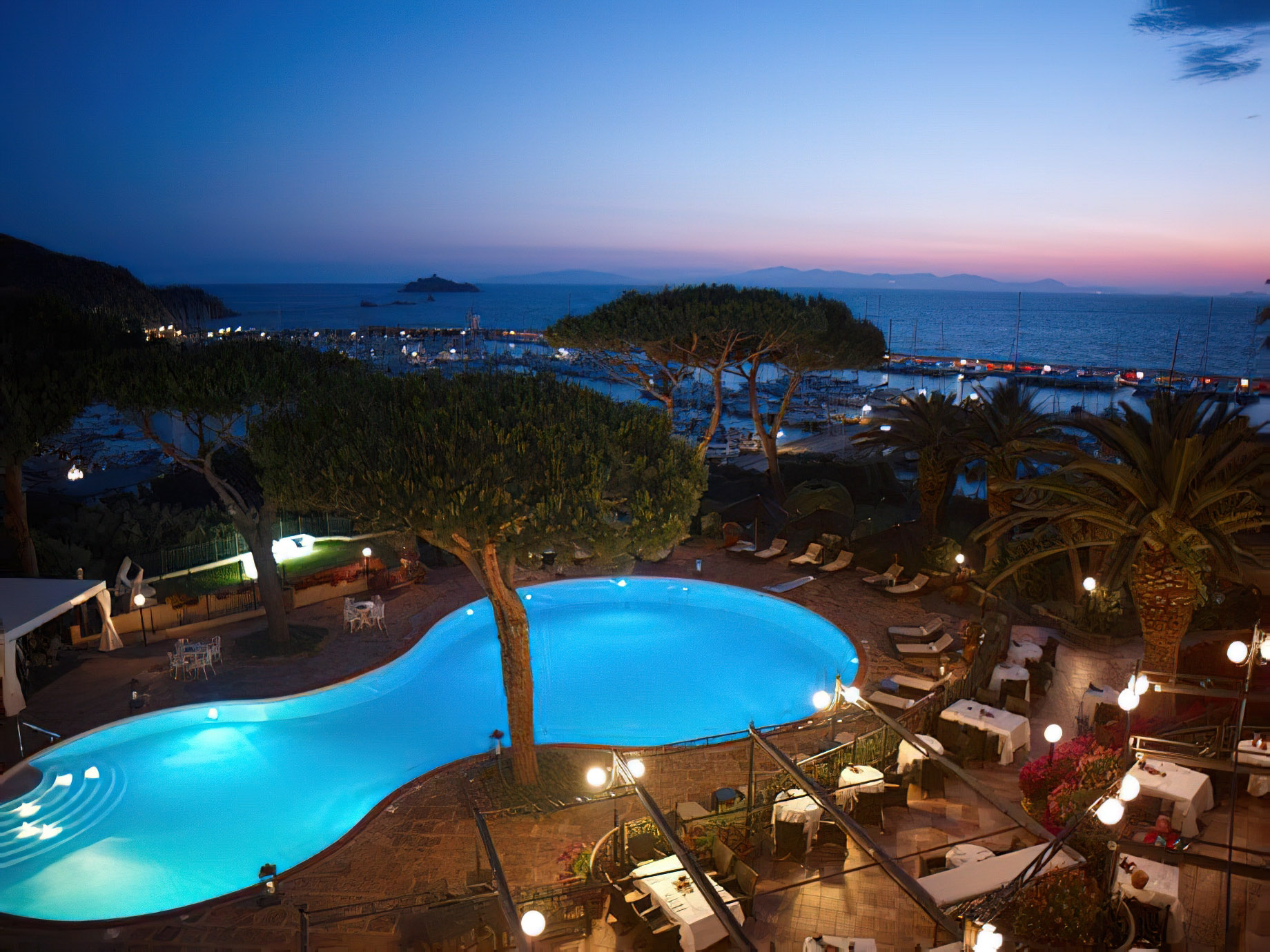 Baglioni Resort Cala del Porto Tuscany Punta Ala, Italy Pool Night View TRAVOH Baglioni Resort Cala del Porto Tuscany Punta Ala, Italy Pool Night View TRAVOH