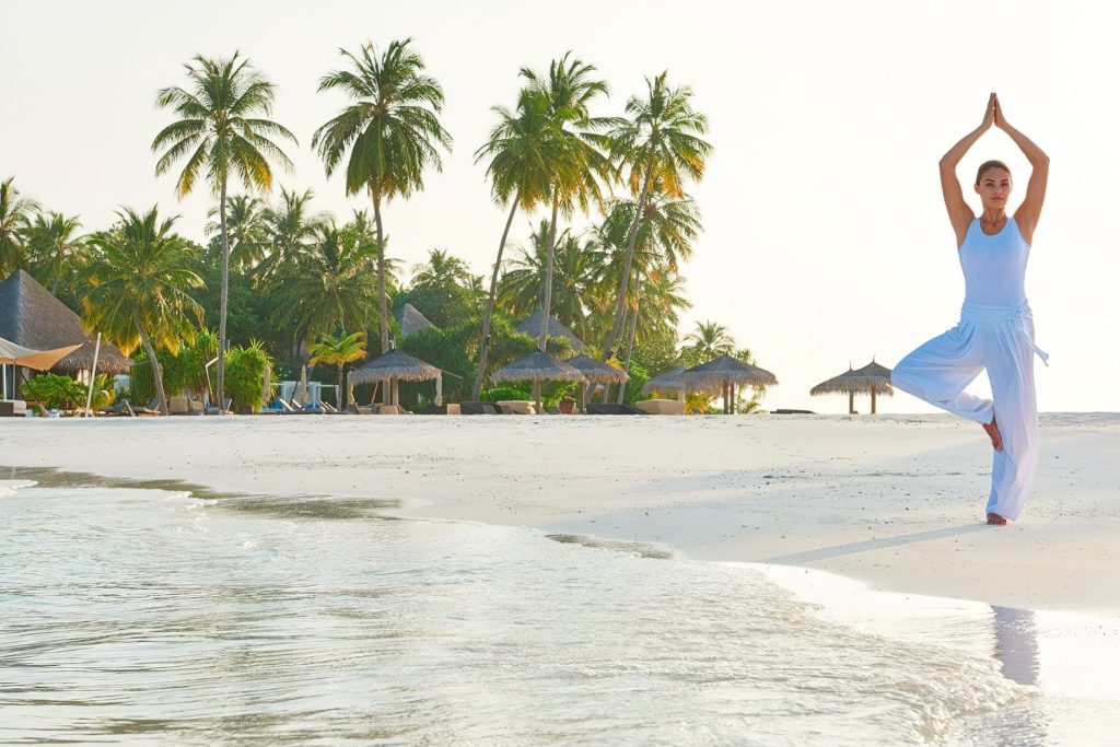 Constance Halaveli Resort - North Ari Atoll, Maldives - Beach Yoga
