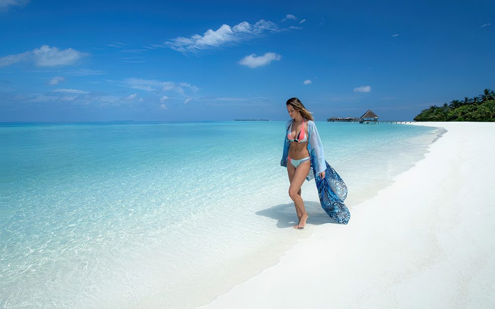 Constance Moofushi Resort - South Ari Atoll, Maldives - Walking on Beach