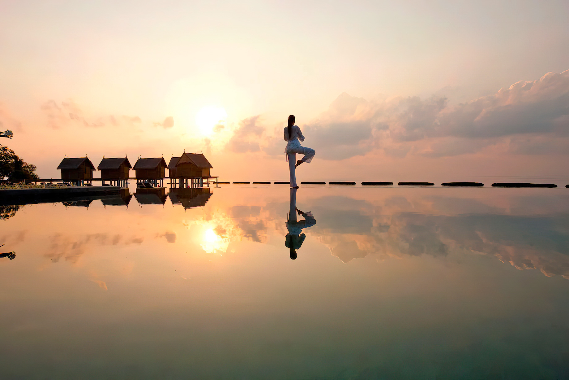 Constance Moofushi Resort - South Ari Atoll, Maldives - Pool Yoga Sunset
