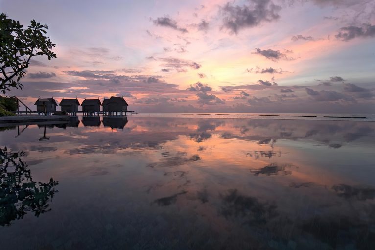 Constance Moofushi Resort - South Ari Atoll, Maldives - Pool Sunset