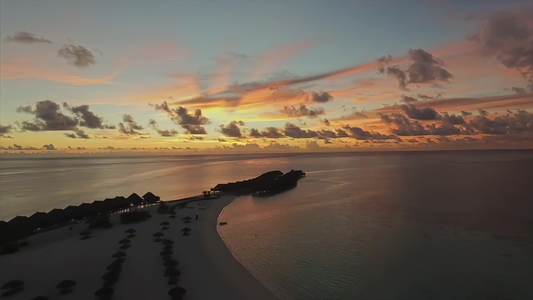 Constance Moofushi Resort - South Ari Atoll, Maldives - Resort Sunset Aerial View