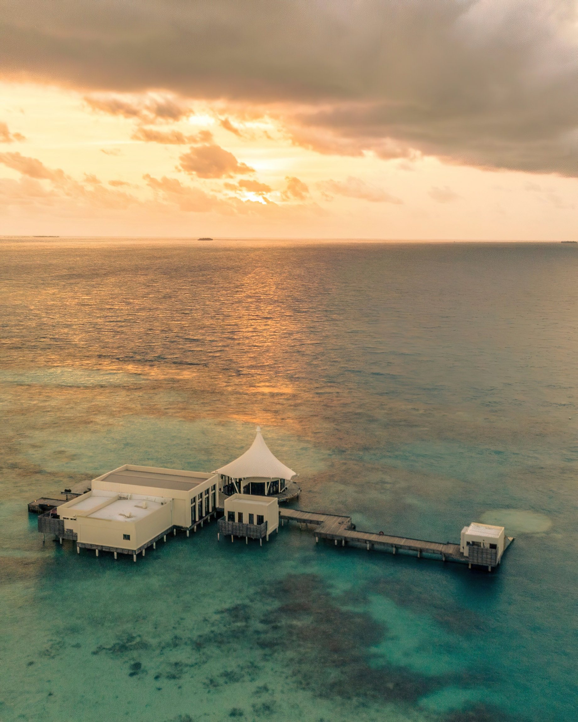 Niyama Private Islands Maldives Resort – Dhaalu Atoll, Maldives – Edge Restaurant Aerial View Sunset
