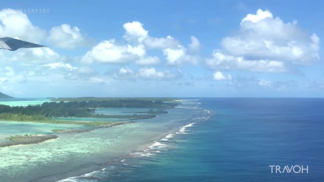 Flying Above Bora Bora, French Polynesia - 4K Travel - Tropical - Clouds - Pacific Ocean - Aerial