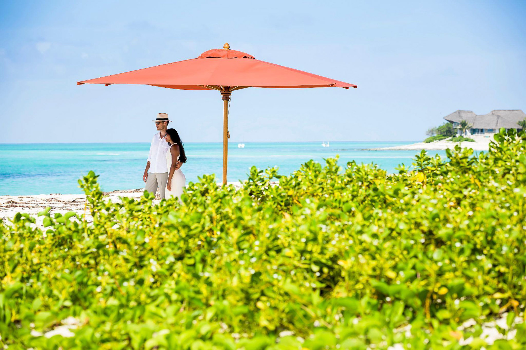 Anantara Medjumbe Island Resort – Mozambique – Couple Walking on Beach
