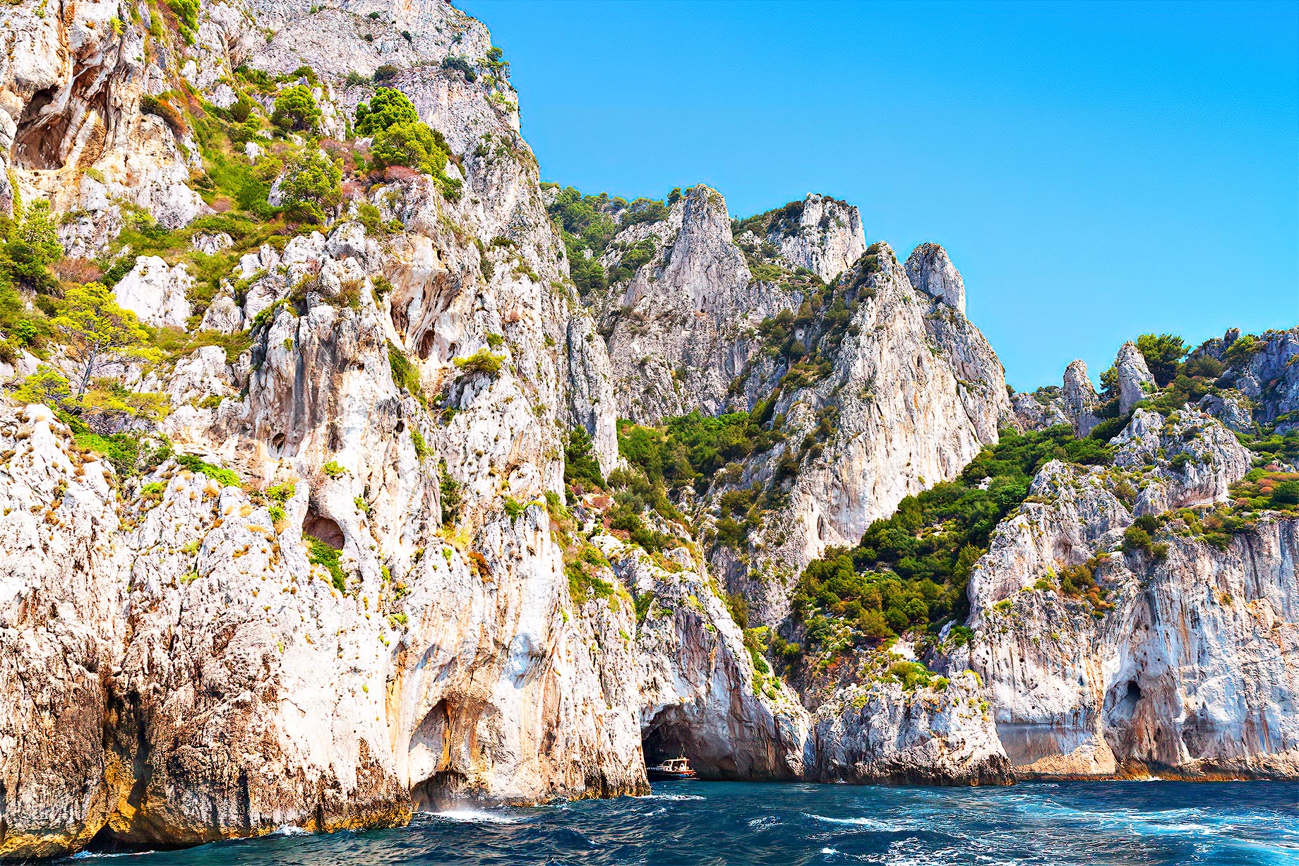 Tourist enters the grotto of Capri