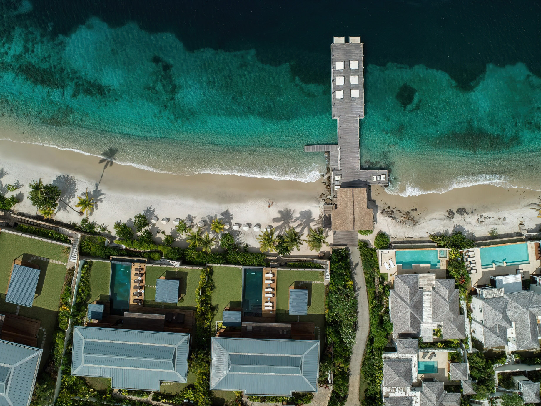 Sugar Beach, A Viceroy Resort – La Baie de Silence, Saint Lucia – South Beach Pier Overhead Aerial View