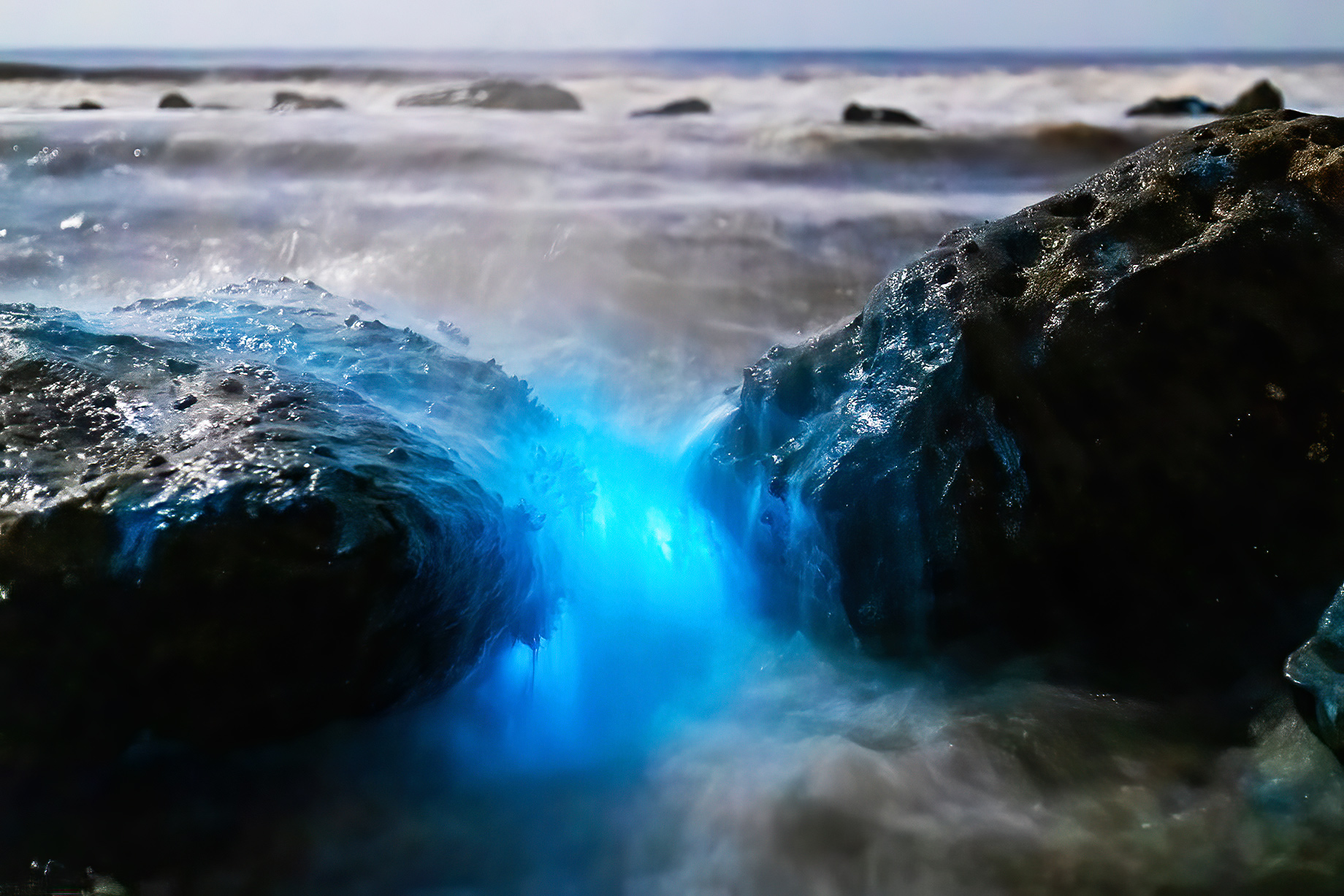 Glowing Sea Pouring Over The Rocks At Scripps Beach, La Jolla, California, USA