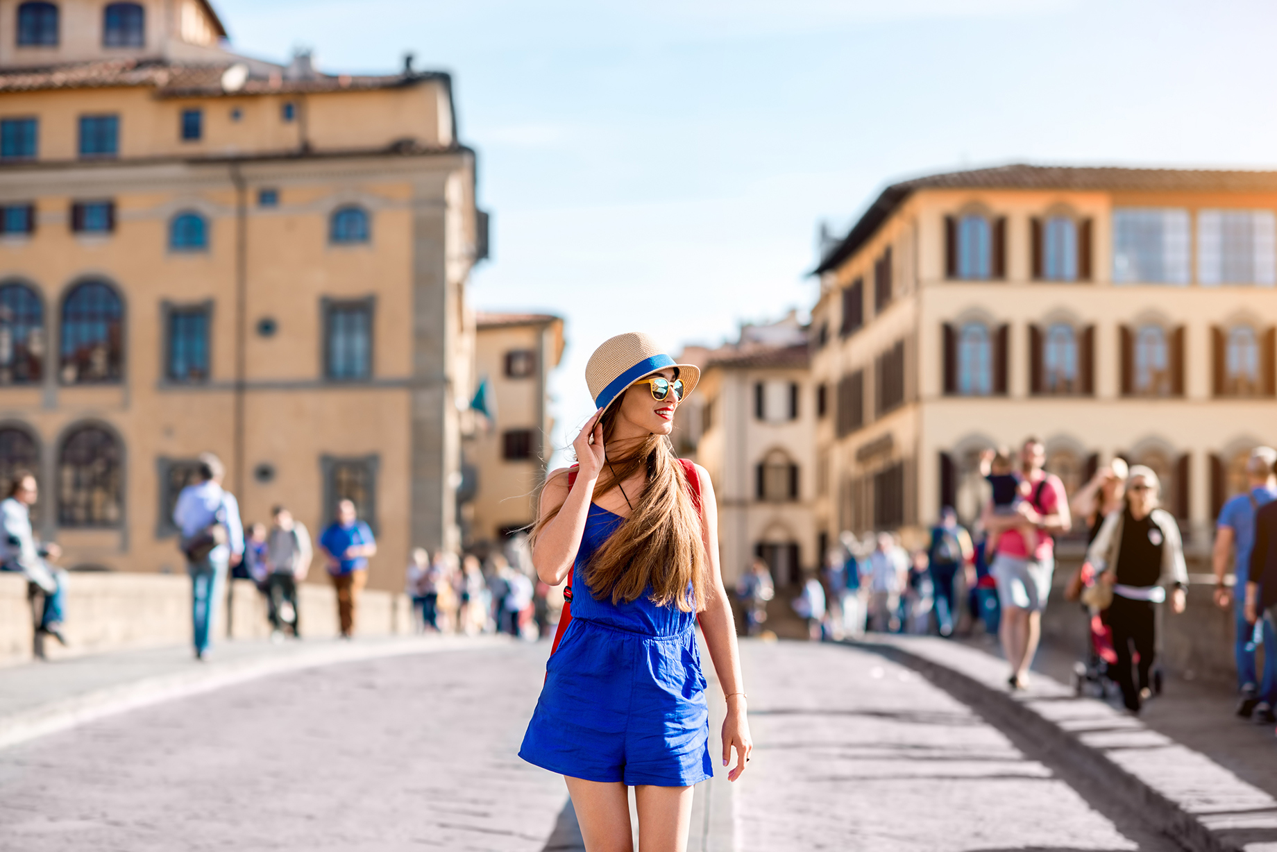 Traveller Walking On Holy Trinity Bridge In Florence City, Italy