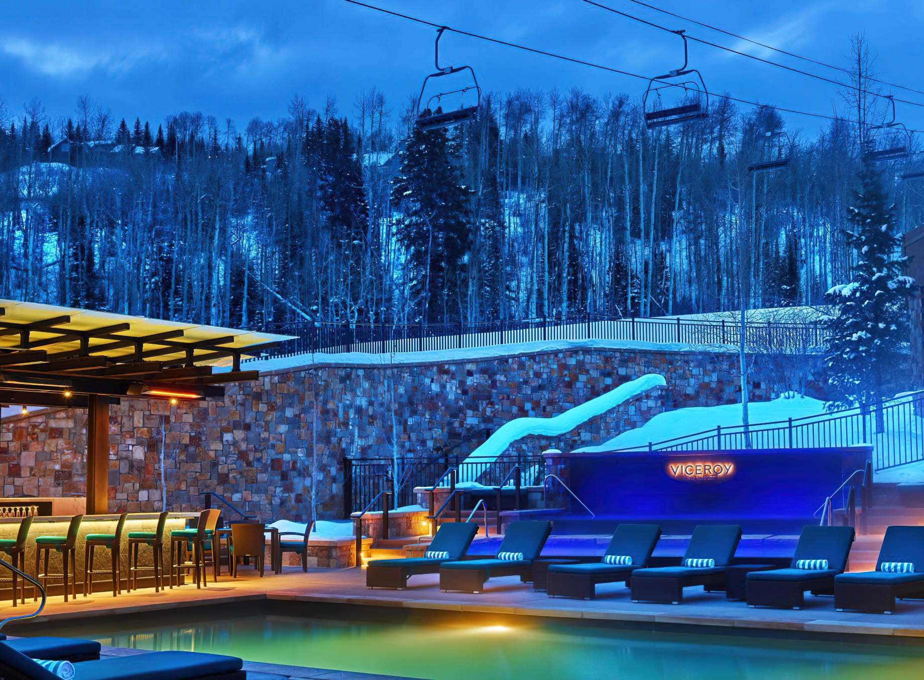 Viceroy Snowmass Luxury Resort – Aspen Snowmass Village, CO, USA – Night View of Pool Area in Winter