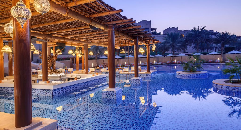 Qasr Al Sarab Desert Resort by Anantara - Abu Dhabi - United Arab Emirates - Evening Pool