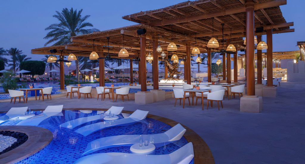 Qasr Al Sarab Desert Resort by Anantara - Abu Dhabi - United Arab Emirates - Evening Pool Deck