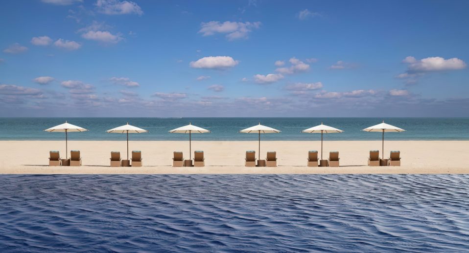 Anantara Sir Bani Yas Island Al Yamm Villa Beach Resort - Abu Dhabi, UAE - Main Pool Sunbed Beach View