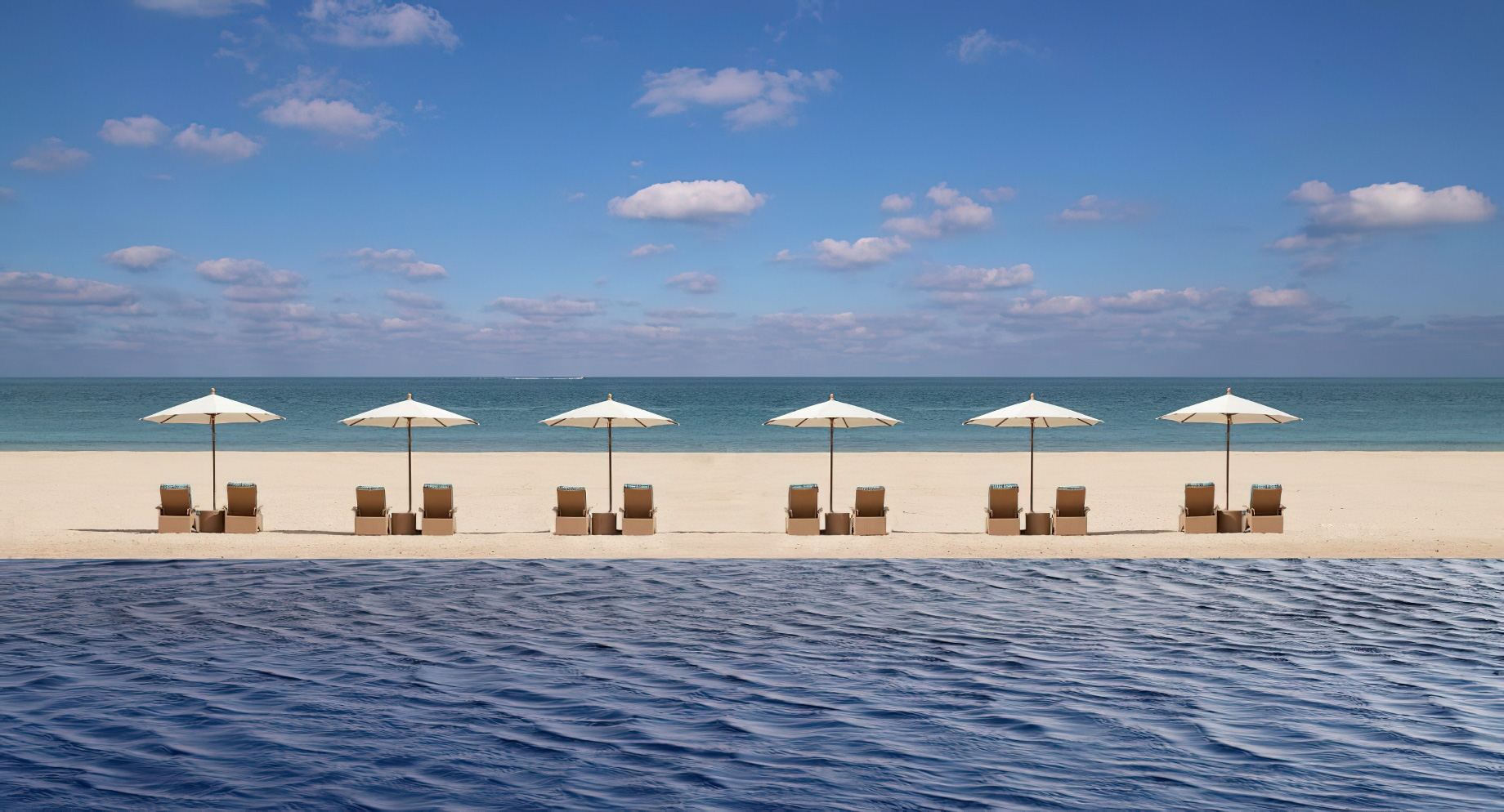Anantara Sir Bani Yas Island Al Yamm Villa Beach Resort – Abu Dhabi, UAE – Main Pool Sunbed Beach View
