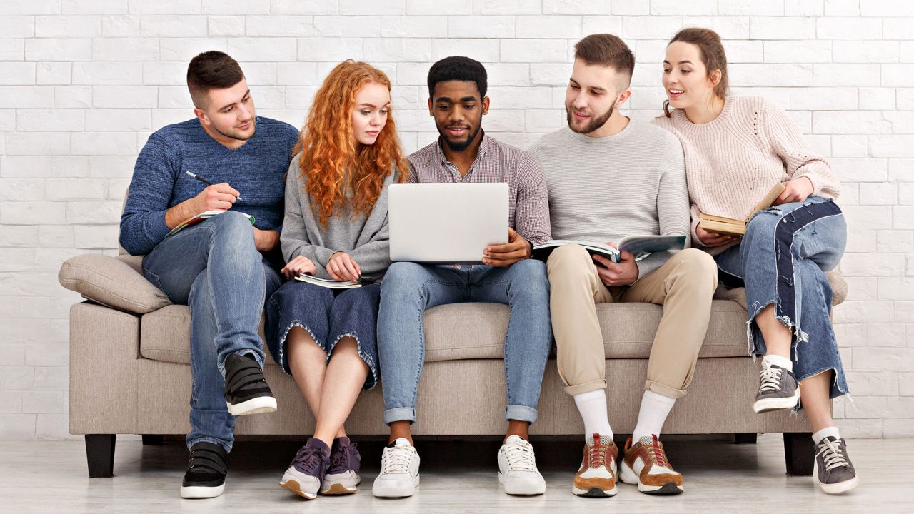 Students Researching Together in an Apartment