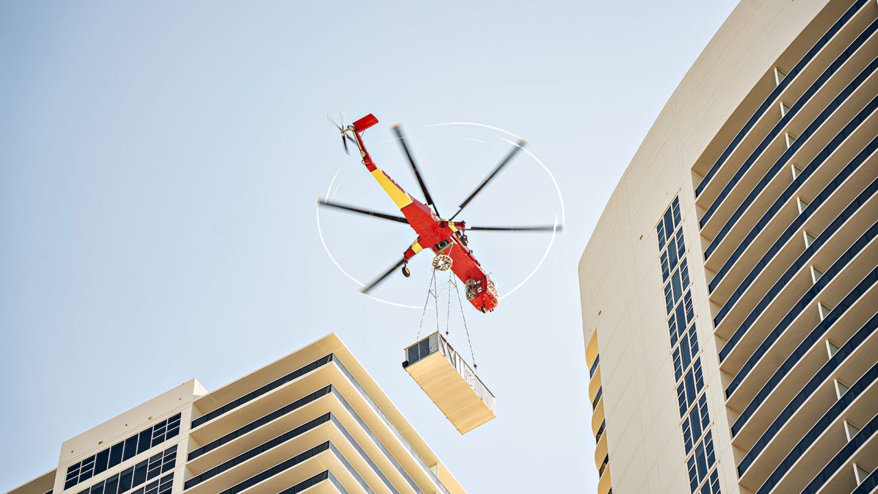 Helicopter Installing Roof-Top Air Conditioning Unit
