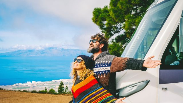 Man and Woman Celebrating RV Life