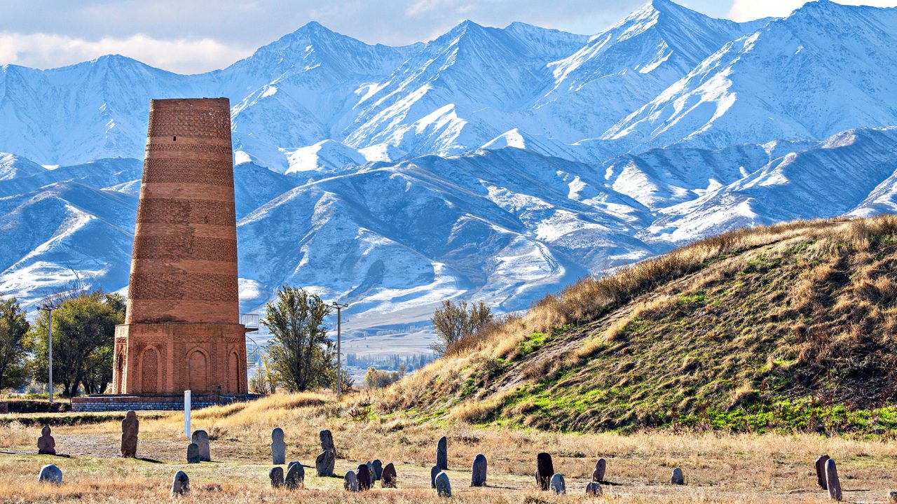 Burana Tower - An Old Minaret in the Ruins of the Ancient Site of Balasagun in Kyrgyzstan with Tombstones Known as Balbas
