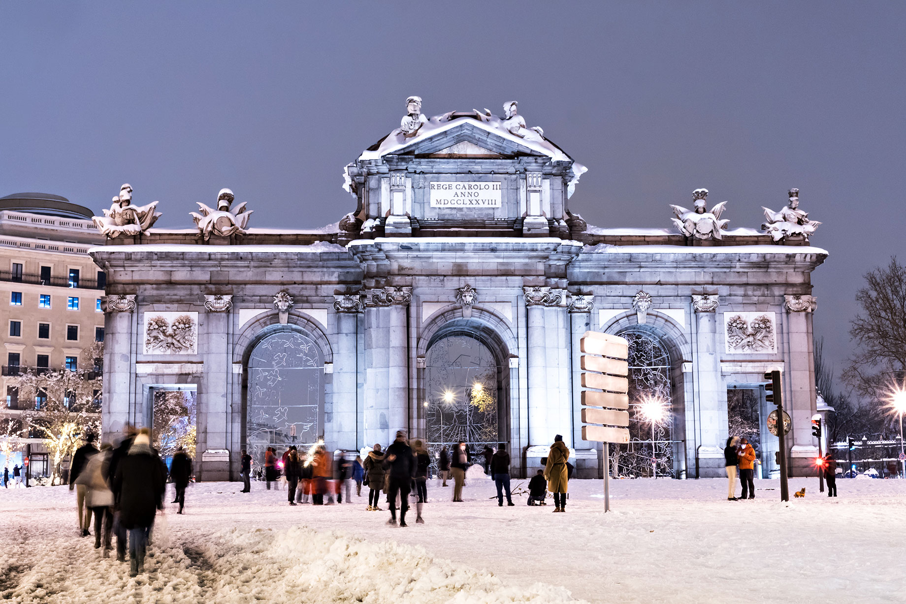 Puerta de Alcalá on a Cold Winter Night After a Heavy Snowfall in Madrid, Spain