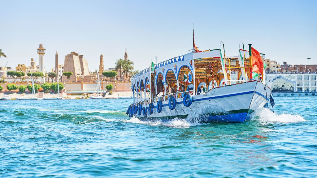 Boat of Tourists Cruising on the Nile River in Luxor, Egypt – TRAVOH