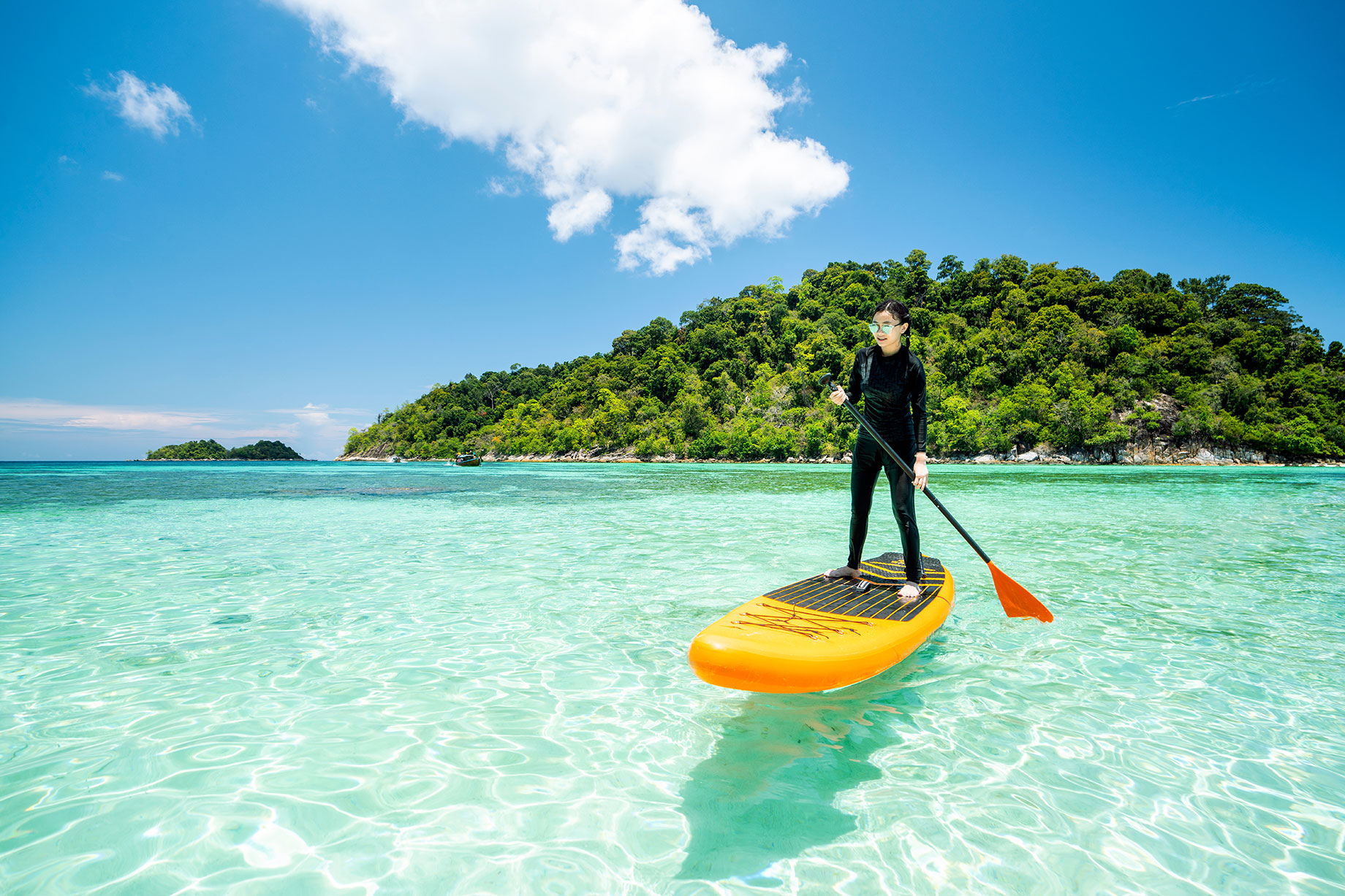 Paddleboarding at Lipe Island in Thailand